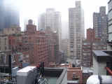 A mist hangs over Manhattan.